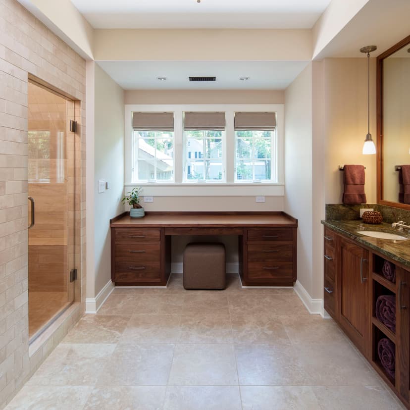 View of a bathroom window above a custom bathroom countertop.